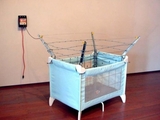 Gesichertes Babybett
