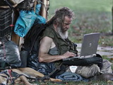 Penner mit Laptop