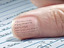 Spickzettel auf dem Finger
